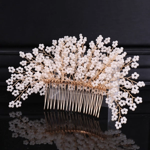 Handmade bridal hair comb with gold wire weaving and white pearls for wedding