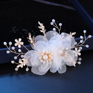 Handmade bridal hair clip with white chiffon flowers and pearls on gold wire