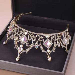 Elegant gold crystal bridal crown with rhinestones in a premium jewelry gift box