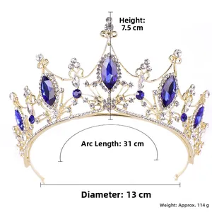 Dimensioni dettagliate della corona da sposa dorata con gemme blu e strass su fondo bianco
