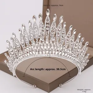 Detailed view of the large silver crystal bridal crown showing 9cm height and 38.5cm length