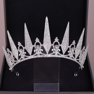 Elegant silver bridal tiara crown with diamond-shaped peaks and sparkling crystals