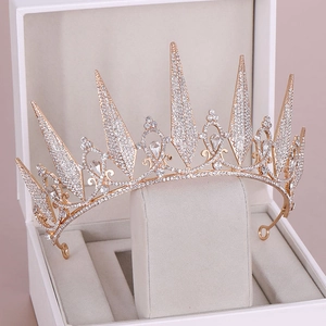 Detail of rose gold bridal crown with crystals in a luxury velvet lined gift box