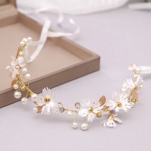 Handmade bridal leaf hairband with white daisies, pearls and crystals on a silk ribbon