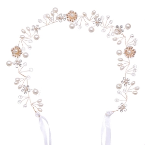 Handmade bridal headband featuring pearls, crystals, and gold wire flowers with white ribbons