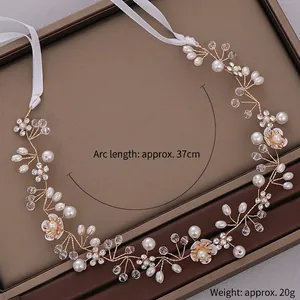 Handmade bridal hairband with white pearls and resin flowers on golden wire, 37cm length