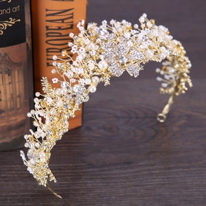 Exquisite bridal tiara with gold wire flowers, white pearls and sparkling rhinestones