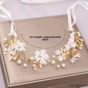 Detail of floral bridal headband with 28cm arc length and 15.4g lightweight design