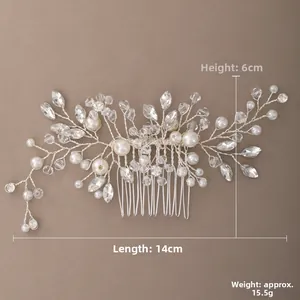 Detail view of a 14cm bridal hair comb with pearls and crystals on a beige background