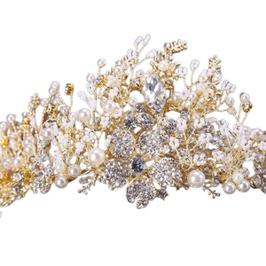 Exquisite gold bridal crown with handmade white pearls and sparkling floral crystals