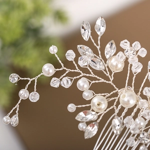 Elegant bridal hair comb with handmade pearls and sparkling crystals on silver wire