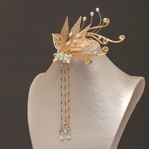 Exquisite gold tassel hair clip with hollow leaves and iridescent flower petals