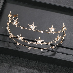 Detail of gold multi-layer star bridal headband with sparkling crystals and stars