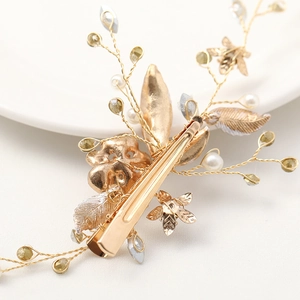 Handmade gold leaf hair clip with yellow beads and white pearls for bridal wedding hairstyles