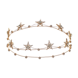 Detailed macro view of the double-layered golden headband with crystal-encrusted stars
