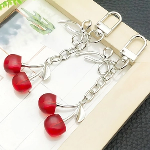 Creative red cherry and hollow silver bow keychains for bags and couples