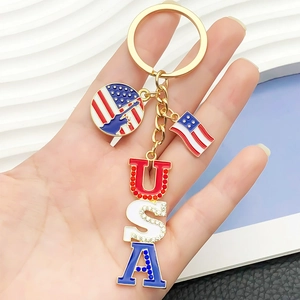 Golden American USA flag keychain with rhinestones and Statue of Liberty pendant charms