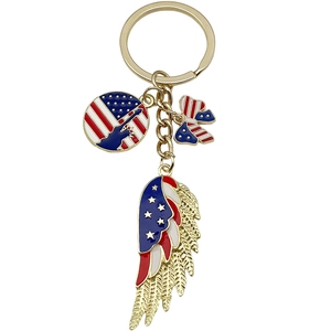 Golden American flag heart and wing keychain with red white and blue enamel charms