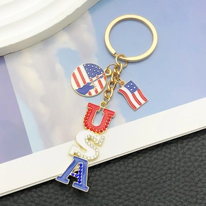 Patriotic USA flag keychain with Statue of Liberty pendant and colorful rhinestones