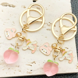 Creative resin Cinnamoroll and peach keychains with gold hardware for backpack charms