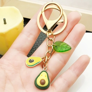 Creative 3D avocado keychain set with gold metal ring and vibrant green fruit charms