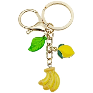 Creative resin fruit keychain with realistic banana, lemon, green leaf and gold hardware