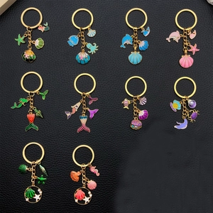 Lot de 10 porte-clés animaux marins colorés avec dauphin, étoile de mer et sirène