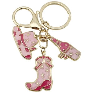Pink western cowboy theme keychain with hat boot and bottle charms in gold finish