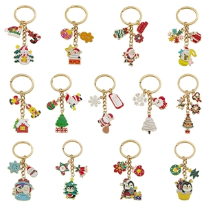 Cute Christmas cartoon keychains set featuring Santa Claus, reindeer, and trees for bags