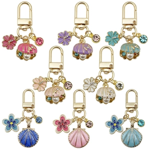 Porte-clés Fleur de Coquille de Künstliche Perle en Émail Alliage de Zinc Plaqué Or Charme de Sac Thème Marin pour Femmes Filles Bijoux Cadeau