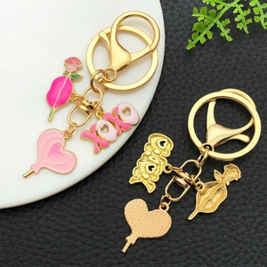 Schlüsselanhänger-Set mit rosa Herz und Rose aus vergoldeter Legierung und XOXO