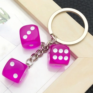 Transparent rose pink resin dice keychain with silver chain and metal ring for bags