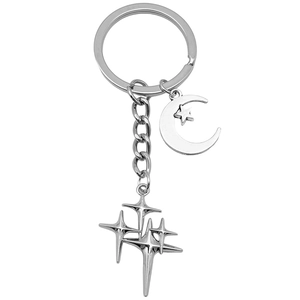 Silver alloy keychain with moon, five-point star, and four-pointed star pendants