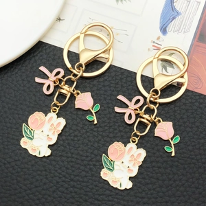 Pink ribbon rose and cute rabbit enamel keychain set with gold-plated lobster clasp hooks