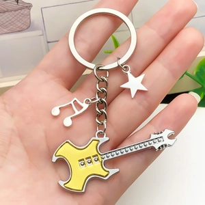 Handheld rock music keychain with yellow electric guitar, musical note, and star charm