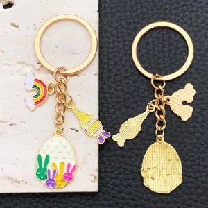 Easter rainbow rabbit and egg keychain with golden metal finish and colorful charms