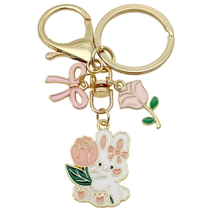 Chinese style enamel rabbit keychain with pink bow and rose on a gold alloy ring