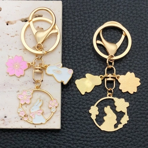 Chinese style rabbit sakura keychain with pink enamel charms and gold metal ring