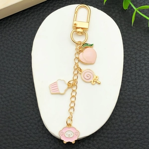 Pink peach and cupcake charm keychain with golden chain and cute sheep pendant