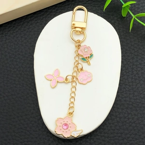 Porte-clés fleurs de cerisier et roses roses en alliage de zinc avec émail rose
