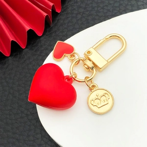 Sweet red 3D heart keychain with golden crown coin charm on premium black leather