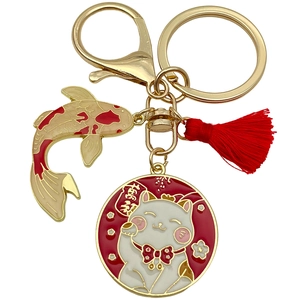 Lucky Maneki Neko and koi fish keychain with red tassel in golden finish