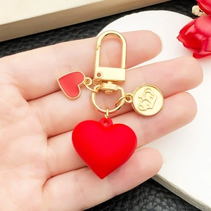 Sweet red matte heart keychain with KC gold crown charm and lobster clasp for bags
