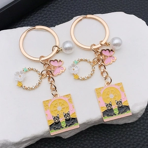 Porte-clés Chat Tarot en Alliage de Zinc Émail Papillon Fleur Couronne Künstliche Perle Pendentif Femme Sac Accessoire de Suspension Cadeau