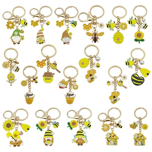 Niedliche gelbe Emaille Bienen und Sonnenblumen Schlüsselanhänger Set mit Goldanhänger