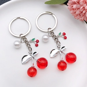 Creative translucent red cherry keychain with white pearl on silver ring for bag decor