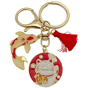 Golden Maneki Neko lucky cat keychain with red tassel and koi fish charm pendant