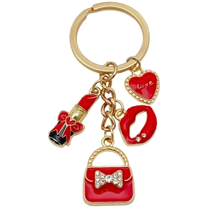 Portachiavi dorato alla moda con ciondoli in smalto rosso a forma di cuore, rossetto e borsa