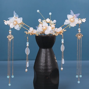 Vintage Chinese gold hairpiece set with white resin flowers and blue bead tassels