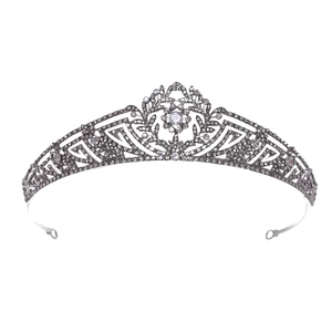 Classic silver bridal tiara with floral rhinestone patterns and symmetrical arch design